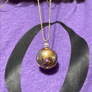 Elegant Globe Jingle Necklace